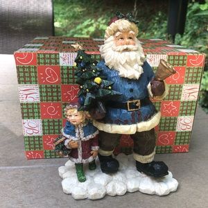 Santa with child and Xmas tree